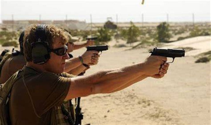 What pistol does the Navy SEALs use 2021?
